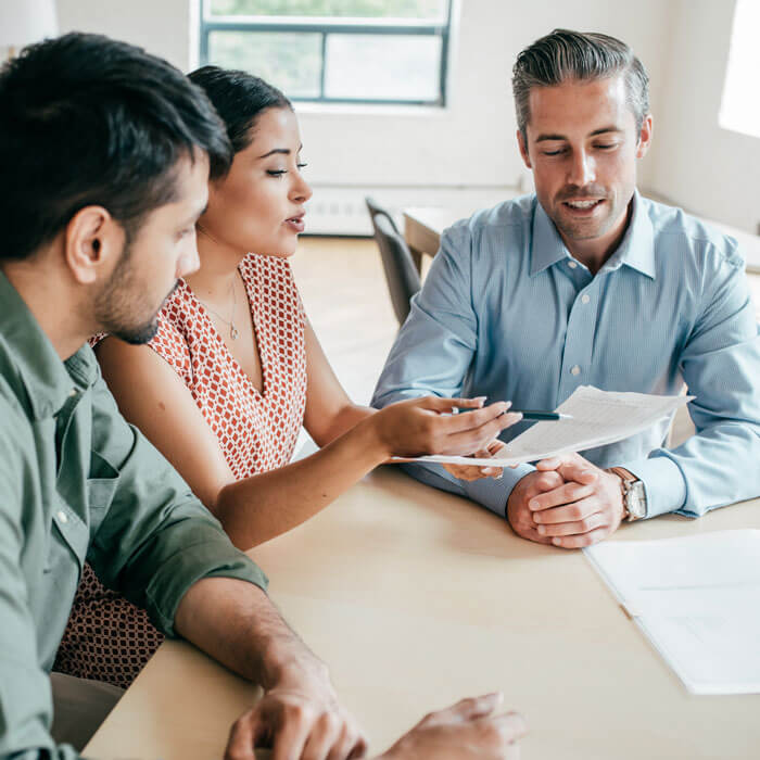 Couple working with mortgage broker